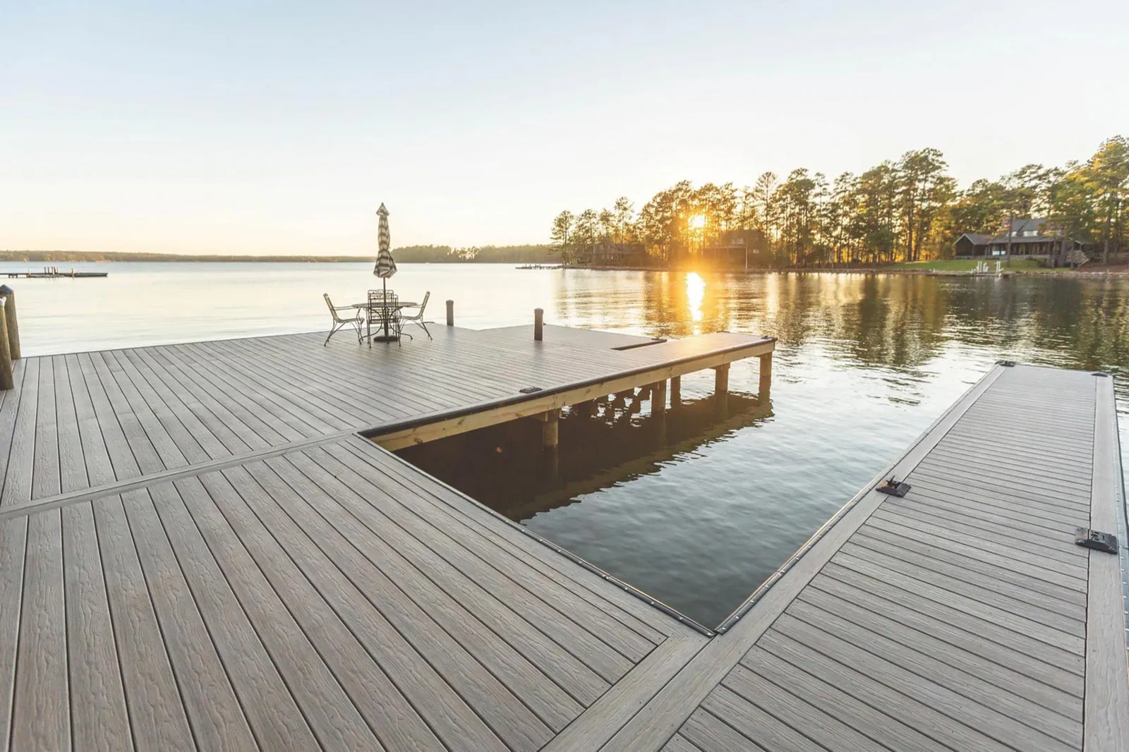 A boat dock at sunset on a Southeast Nebraska lake built by Outback Construction