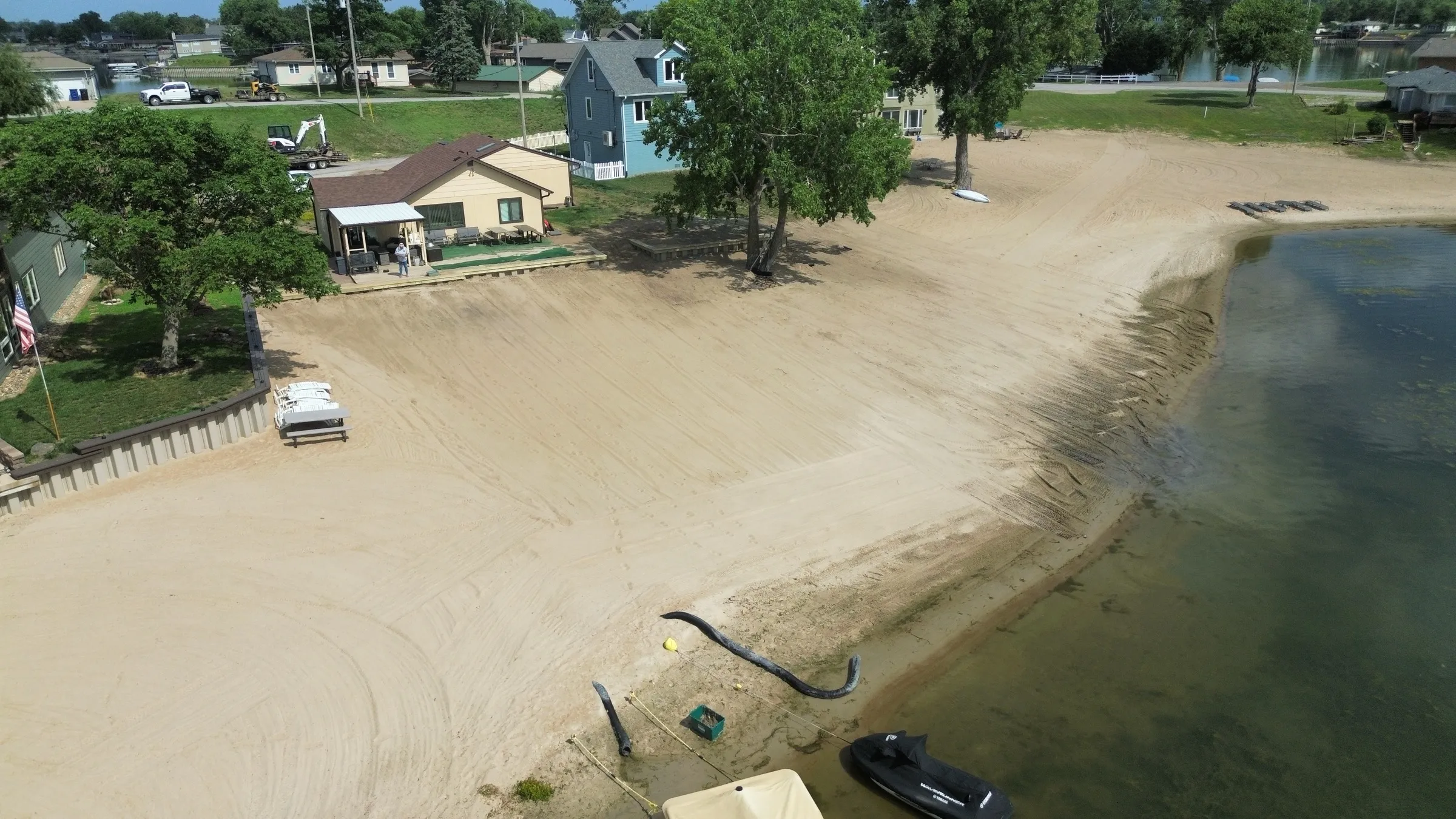 Beach reclamation — fresh graded sand shoreline by Outback Construction