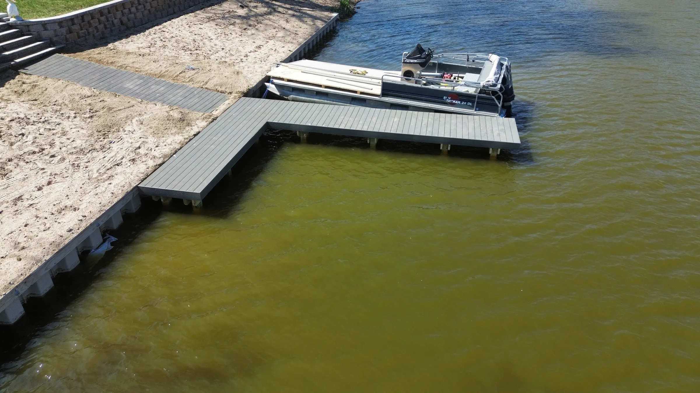 Custom boat dock and moorage built by Outback Construction